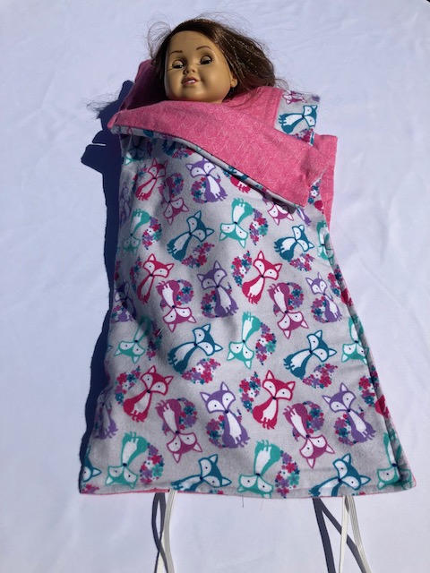 Doll in a sleeping bag